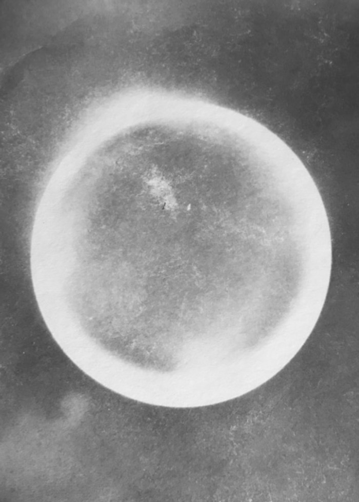 a black and white image of a lunar eclipse.